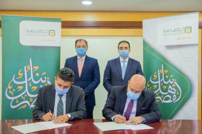 توقيع بروتوكول تعاون بين"أمان" والبنك الأهلي  لنشر 25 ألف ماكينة بيع