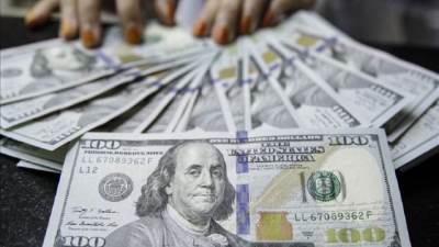 الشهادات الدولارية حاليًا بالأسواق.. والخبراء: الحل الأمثل لعدم تعويم الجنيه والحد من السوق السوداء