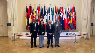 رئيس اقتصادية قناة السويس يستعرض الفرص الاستثمارية أمام منظمة التعاون الاقتصادي والتنمية